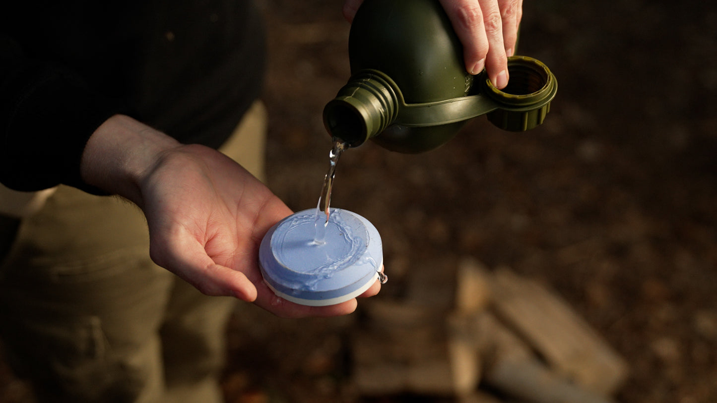 Axe sharpening stone with a leather pouch